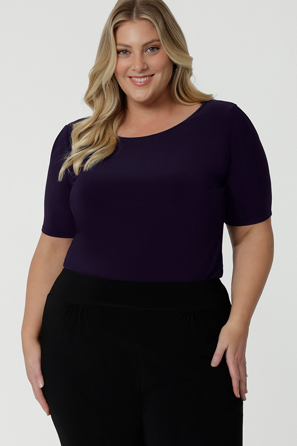 A good work top for plus size women, this is a boat neck top in amethyst jersey. Full of stretch this comfortable top is easy to wear and easy-care. Made in Australia by Australian and New Zealand women's clothes brand, Leina & Fleur, shop tops for petite to plus size women online.