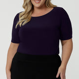 A good work top for plus size women, this is a boat neck top in amethyst jersey. Full of stretch this comfortable top is easy to wear and easy-care. Made in Australia by Australian and New Zealand women's clothes brand, Leina & Fleur, shop tops for petite to plus size women online.