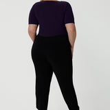 Back view of a good work top for plus size women, this is a boat neck top in amethyst jersey. Full of stretch this comfortable, short sleeve top is easy to wear and easy-care. Made in Australia by Australian and New Zealand women's clothes brand, Leina & Fleur, shop tops for petite to plus size women online.