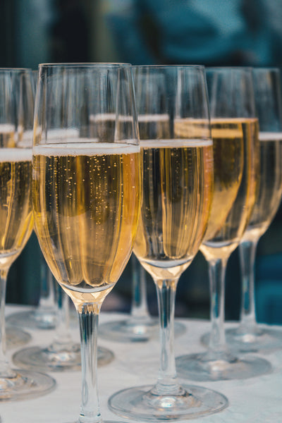 Champagne on arrival - toast your party dress style thanks to L&Fs occasion and party dresses for curvaceous and plus size women, all made in Australia