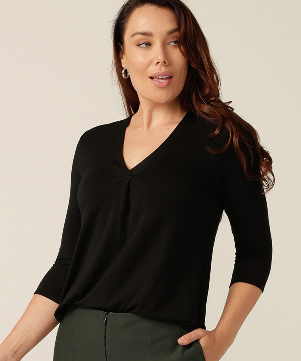 Flattering tailored top with 3/4 sleeves and v-neckline.