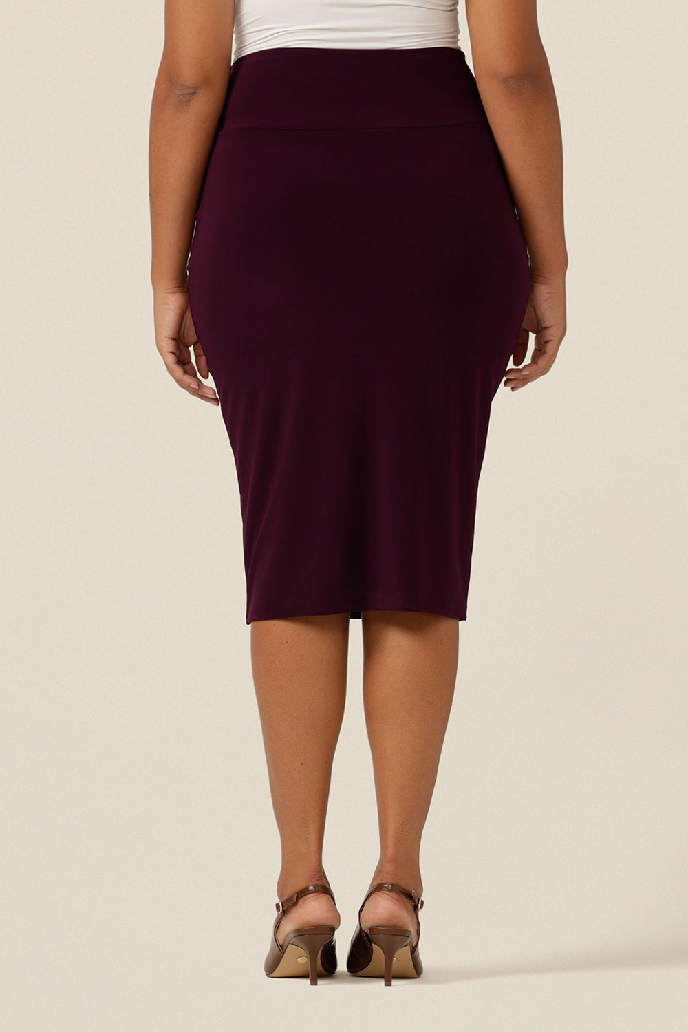 Back view of a knee-length pencil-shape tube skirt in Mulberry jersey.