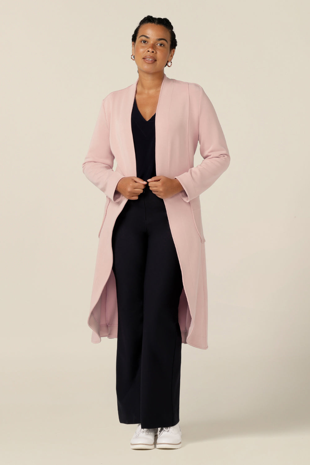 A good lightweight coat for travel, this softly tailored trenchcoat by Australia and New Zealand fashion brand, L&F is made in winter-weight modal to shape comfortable coat for petite to plus size women.