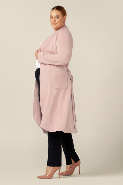 A good lightweight coat for fuller figures, the stretch modal of this dusty pink trenchcoat by Australia and New Zealand women's clothing label, L&F fits well for all shapes and sizes. Layer over your workwear for winter office style.