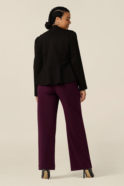 Back view of an Australian-made wide leg, full length jersey trouser in Mulberry red. Made by Australian and New Zealand fashion label, L&F these straight leg, corporate pants promise to be a comfortable workwear trouser for sizes 8 to size 24. 