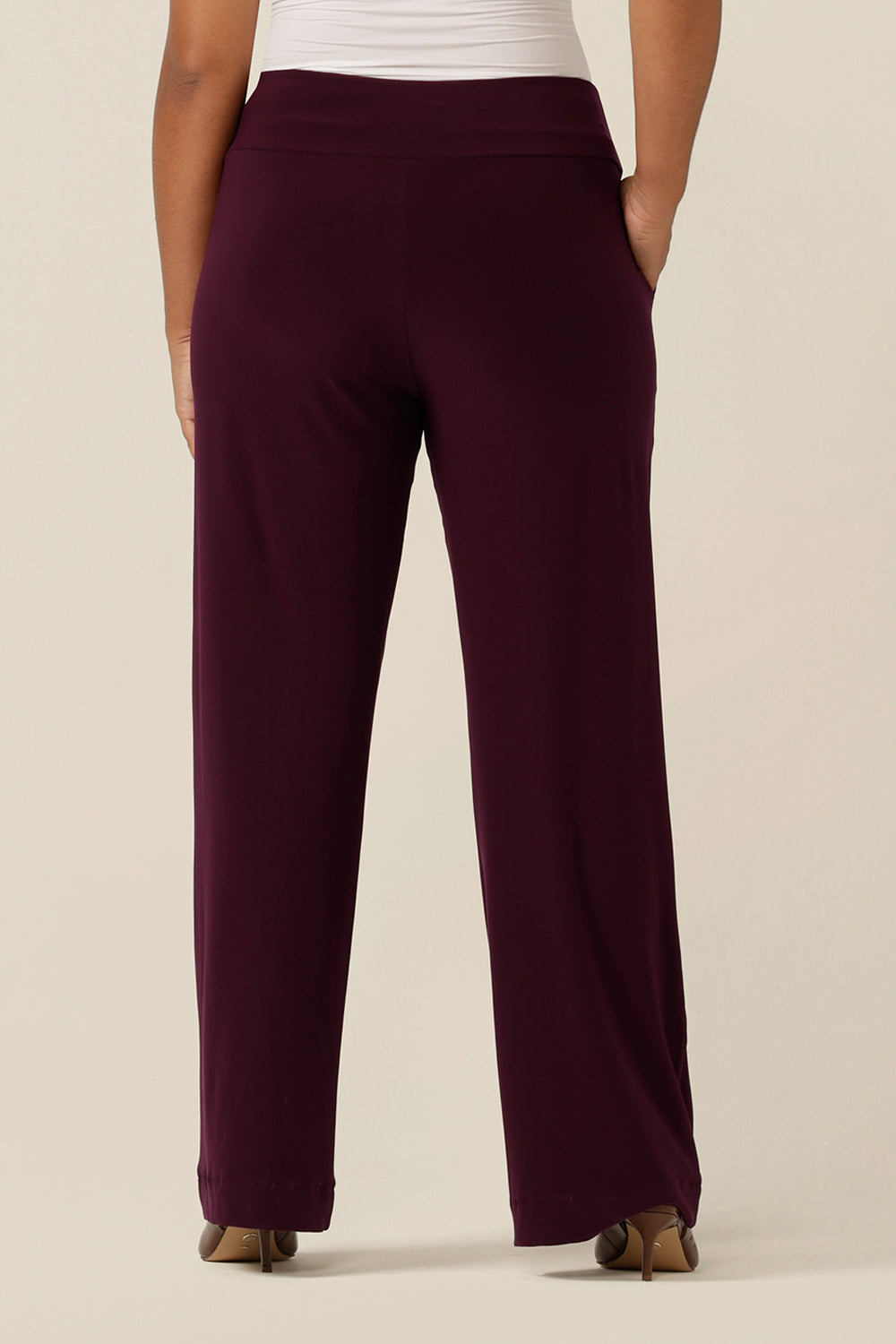 Back view close up of an Australian-made, wide leg, full length jersey trouser in Mulberry red. By Australian and New Zealand women's clothing brand, L&F these straight leg, corporate pants promise to be a comfortable workwear trouser for sizes 8 to size 24. 
