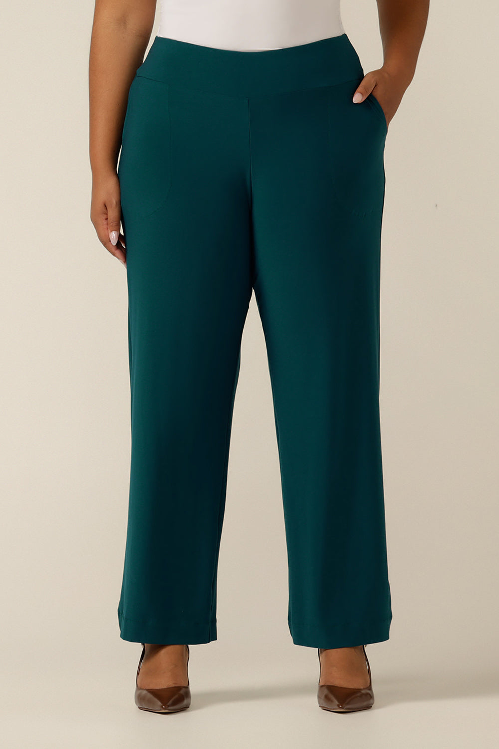 A close up of an Australian-made wide leg, full length petrol green jersey pant in plus size, size 18. By Australian and New Zealand women's fashion brand, L&F these wide leg work pants promise to be a comfortable corporate trouser for sizes 8 to size 24. 