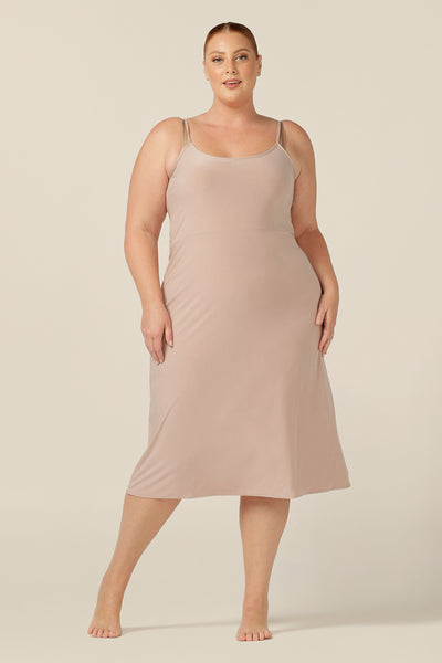 The ultimate smoothing undergarment, this midi-length reversible jersey slip is made-in-Australia in an inclusive 8 to 24 size range. A neutral, flesh tone slip, it layers well under dresses and skirts.