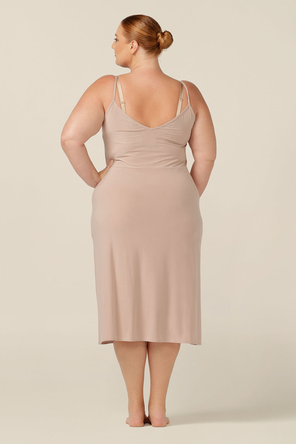 The ultimate smoothing undergarment, this midi-length, reversible, nude jersey slip is made-in-Australia in an inclusive 8 to 24 size range.
