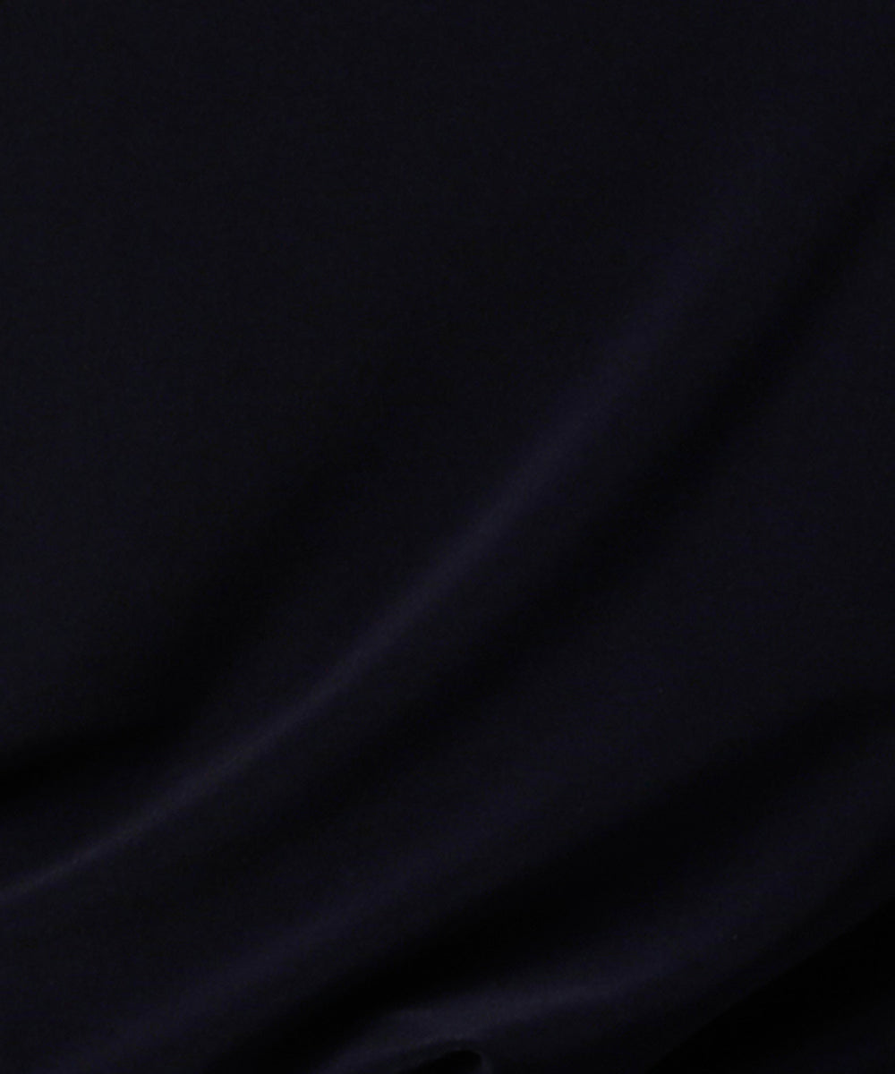 swatch of navy blue jersey fabric used by Australian and New Zealand women's clothes brand, Leina & Fleur to make an elegant navy occasion dress for petite to plus size women.