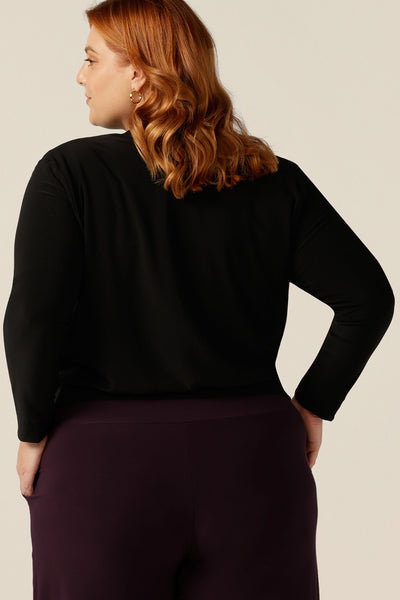the back view of Australian women's clothing brand, Leina & Fleur's jacket/cardigan Jacardi. Designed as an autumn/winter jacket, this cover-up is warm with long sleeves and heavy weight jersey fabric, which adds to this jacket's comfortable fit for workwear and casual layering