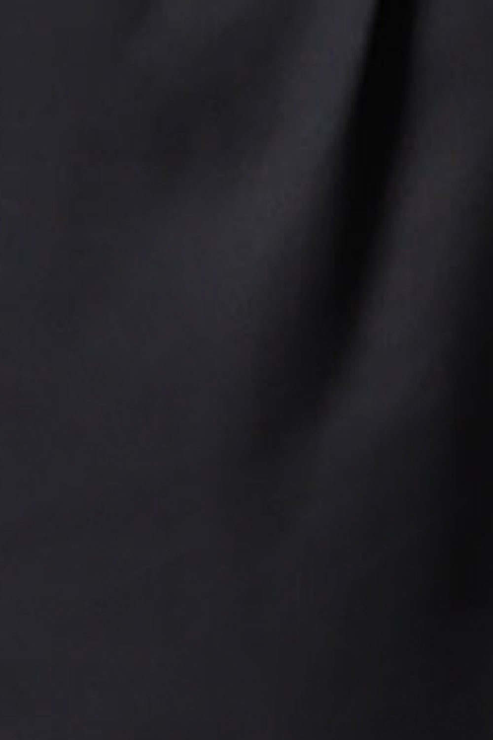 Swatch of Leina & Fleur's sustainable Tencel fabric in midnight blue. Lightweight and breathable, this eco-conscious fabric is used to make the Australian clothing brand's range of eco-conscious work wear shirts for women across Australia and New Zealand.